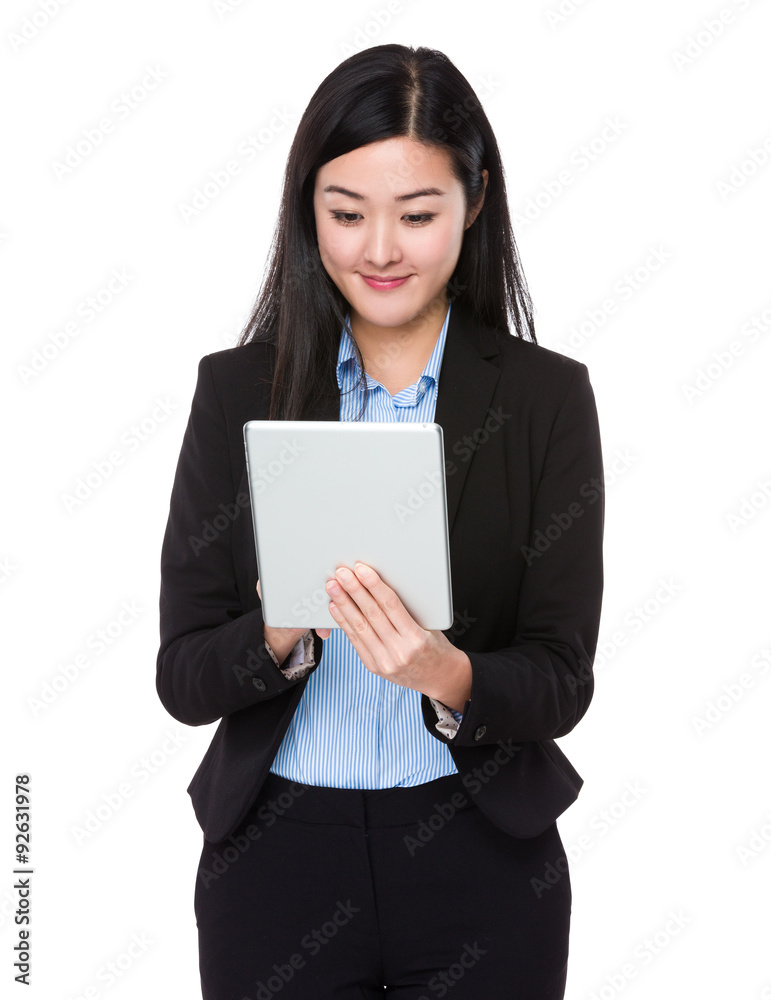 Businesswoman use of the tablet pc Businesswoman use of the tablet pc