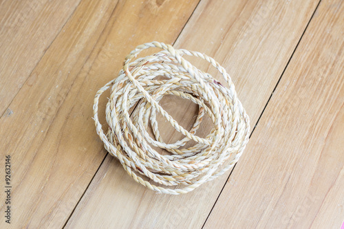 roll rope on wooden board