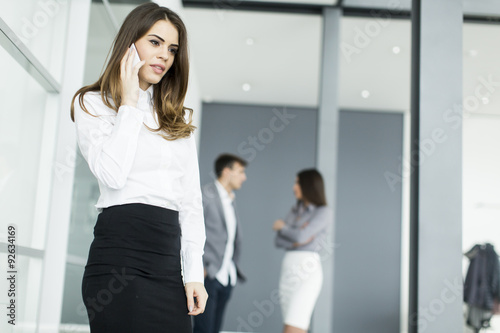 Young woman in office with ...