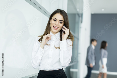 Young woman in office with ...