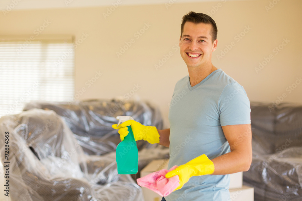 young man doing housework young man doing housework