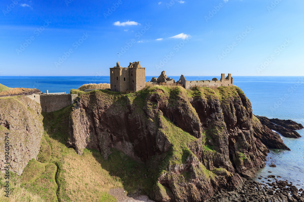 Dunnottar Castle with blue sky in - Stonehaven, Aberdeen, Scotla Dunnottar Castle with blue sky in - Stonehaven, Aberdeen, Scotla
