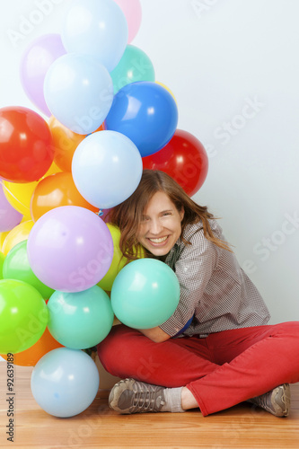 Woman Hugging Balloons