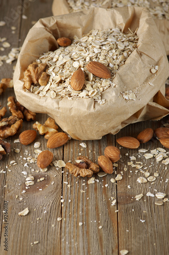 Oatmeal with nuts in paper bag