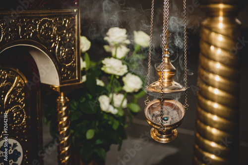Fotografi censer with smoke  in church