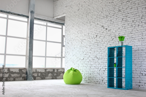 Interesting design on a background of white bricks with green decor