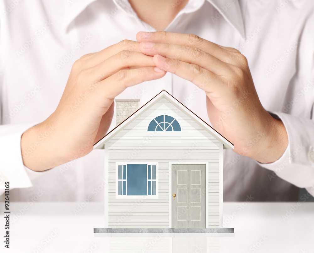 holding house representing home ownership holding house representing home ownership