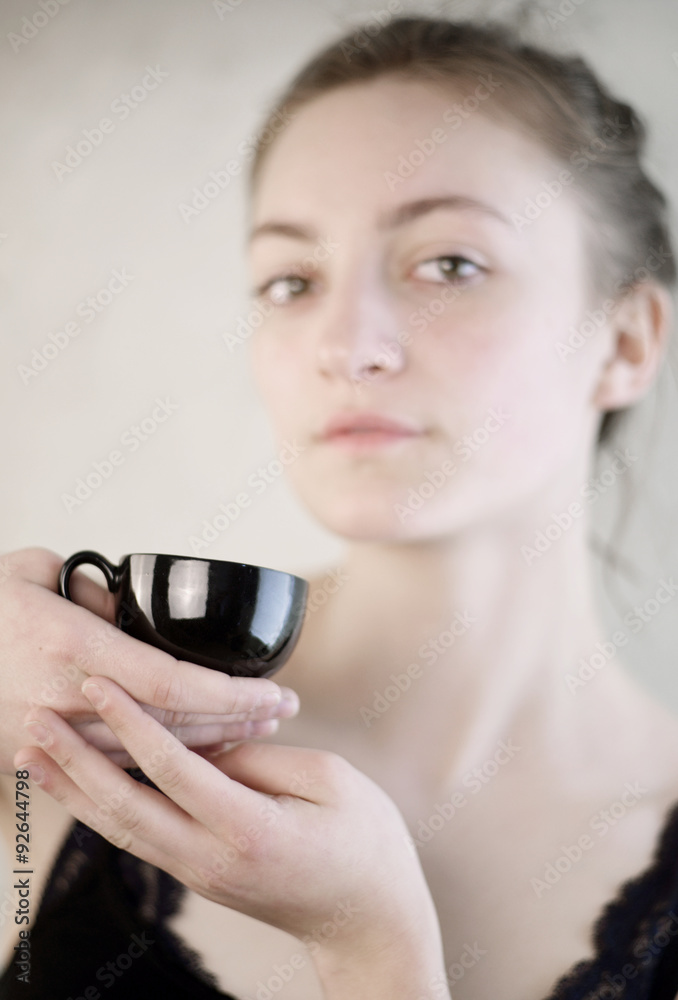Woman with Espresso Cup StockFoto Adobe Stock