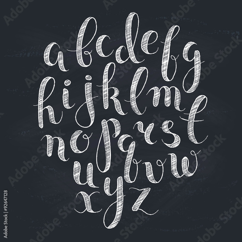 Handmade letters. Handwritten alphabet on blackboard. Hand drawn calligraphy. Modern chalk typography.