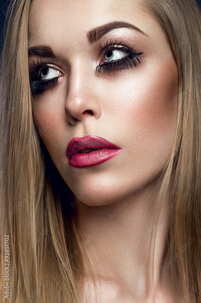 Beautiful portrait of a woman with fashion makeup Beautiful portrait of a woman with fashion makeup