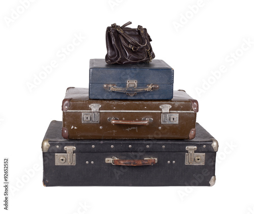 Stack of old suitcases isolated