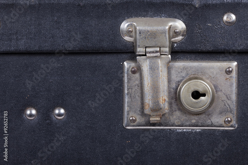 Lock of an old black suitcase