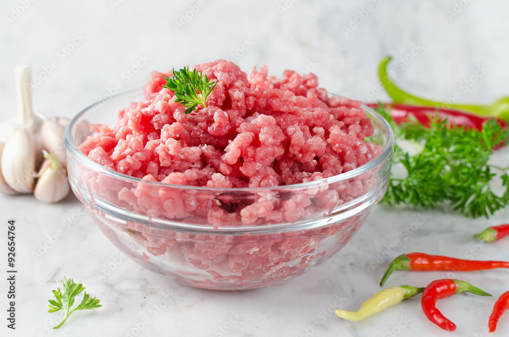 Raw ground beef and ingredients Raw ground beef and ingredients