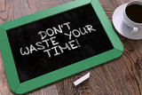 Don't Waste Your Time Concept Hand Drawn on Chalkboard.