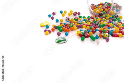 multi colored candy spilled onto table 