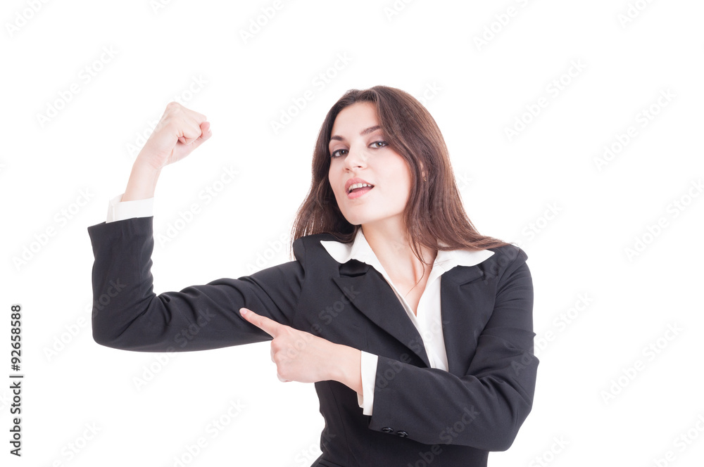 Strong and confident business woman flexing arm and showing powe Strong and confident business woman flexing arm and showing powe