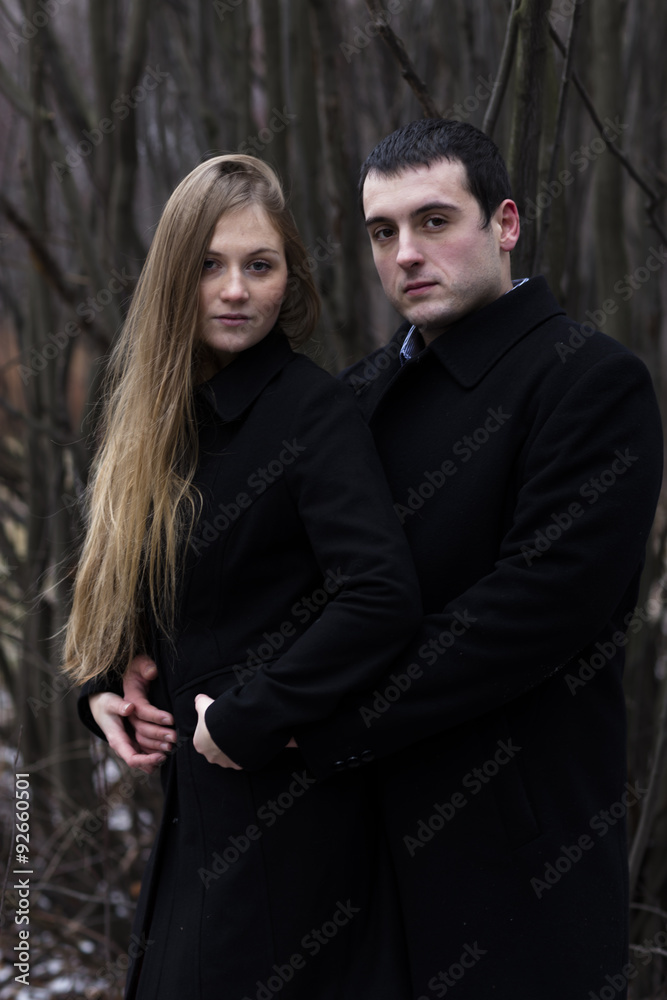 young couple looking to camera young couple looking to camera