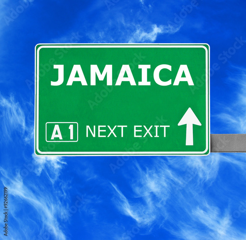 JAMAICA road sign against clear blue sky