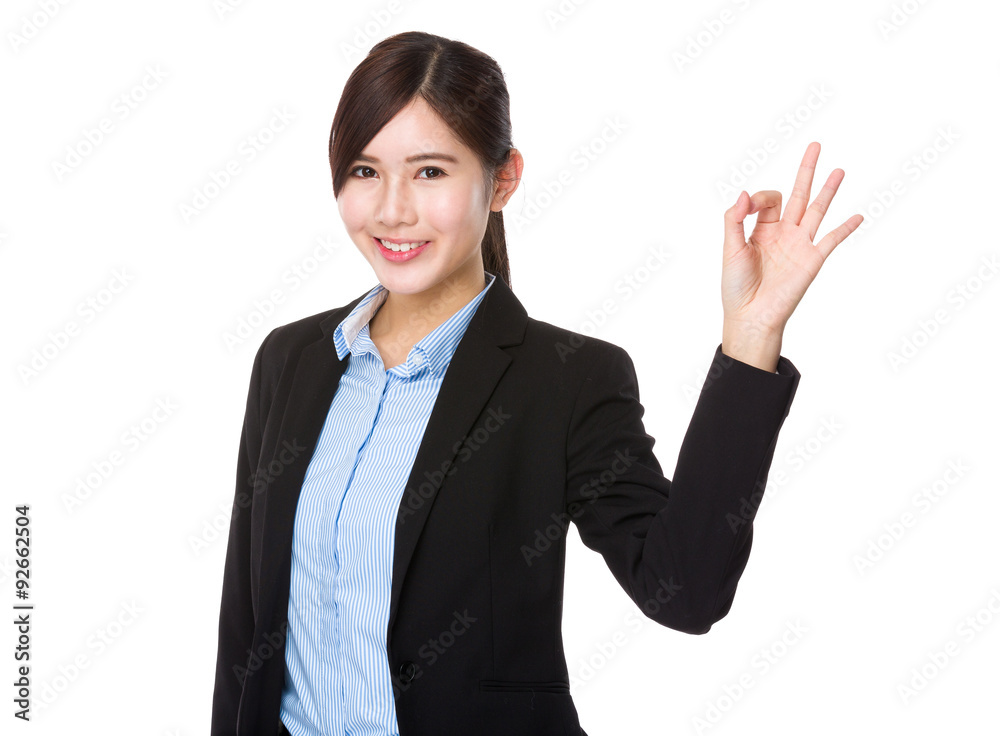 Asian young businesswoman with ok sign gesture Asian young businesswoman with ok sign gesture
