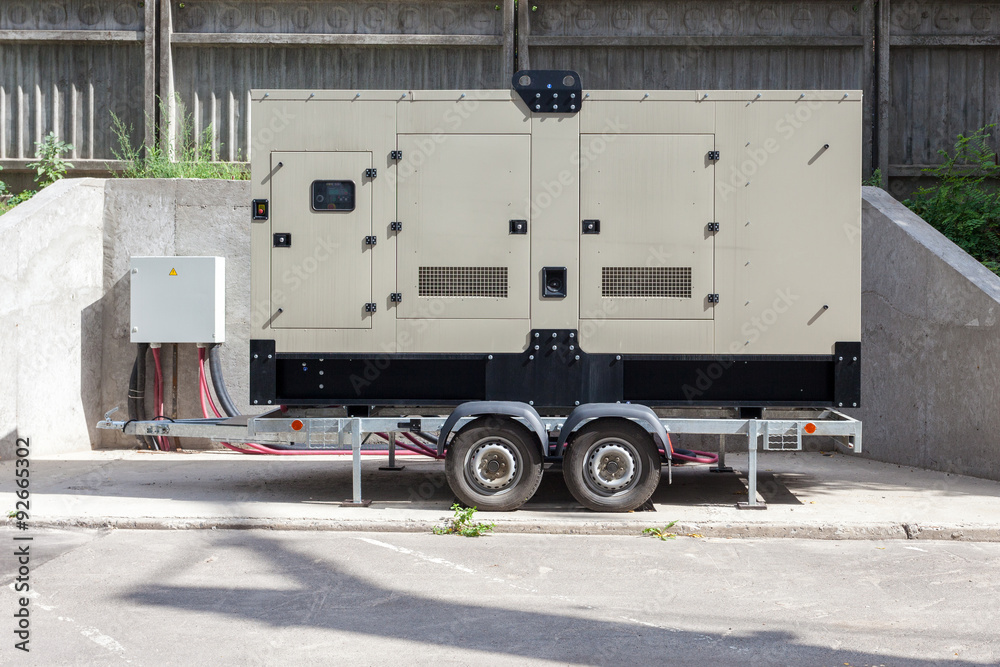 Big Backup Generator for Office Building connected to the Control Panel with Cable Wire