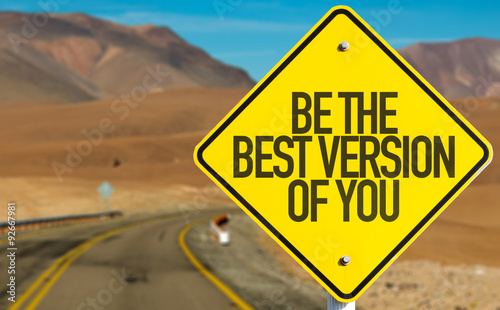 Photography Be The Best Version Of You sign on desert road
