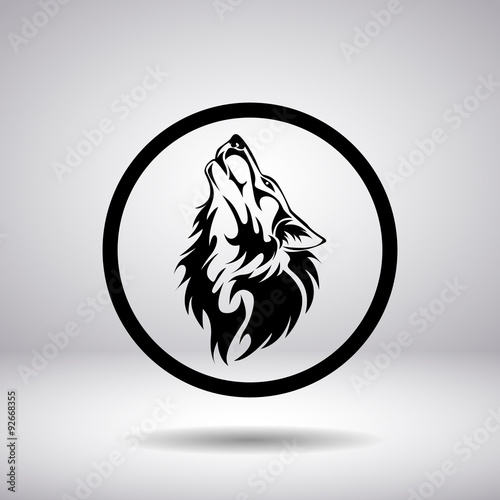 Silhouette of a wolf head in a circle