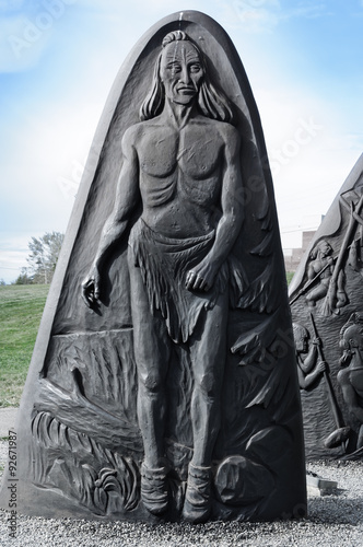 historic cast iron sculpture of a Native Amerindian , Gaspe, Quebec, Canada