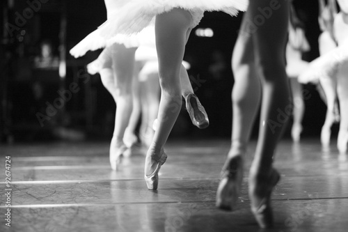 Effortless pirouettes, ballerinas performing on stage