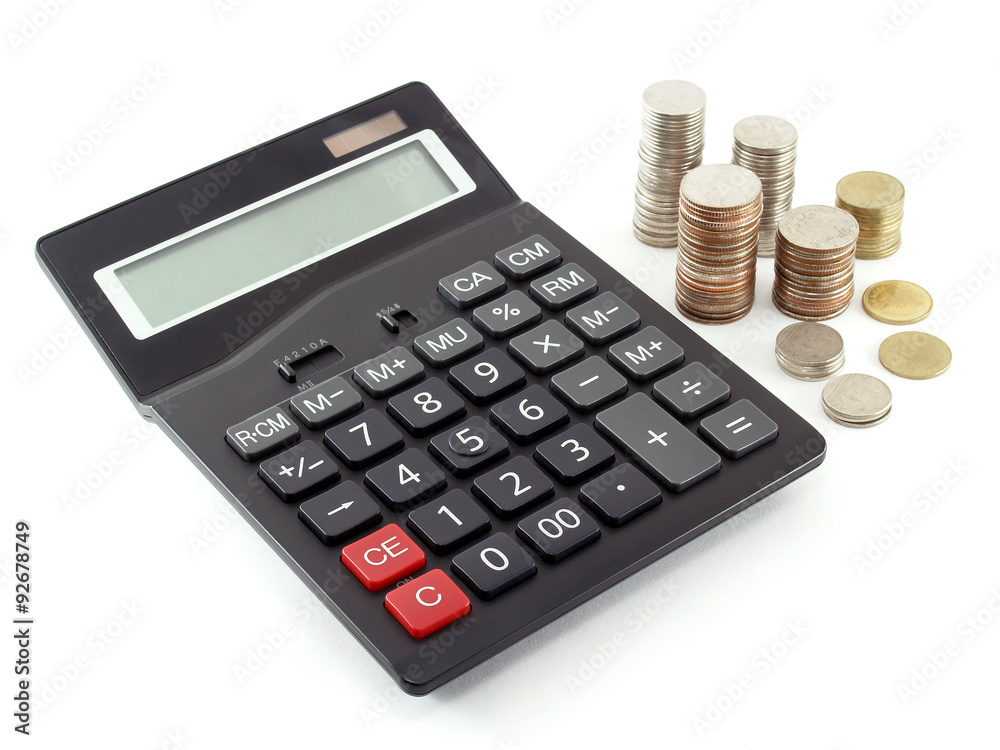 black digital calculator with blank screen and stack of thai baht coins isolated on white background, electronic office supplies for accounting or banking, financial investment or saving money concept black digital calculator with blank screen and stack of thai baht coins isolated on white background, electronic office supplies for accounting or banking, financial investment or saving money concept