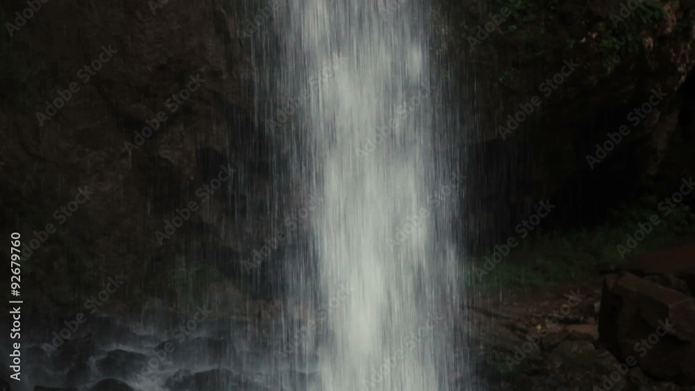 A small waterfall in the mountains A small waterfall in the mountains