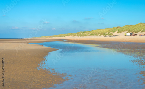Blue sky over a beach along the North Sea