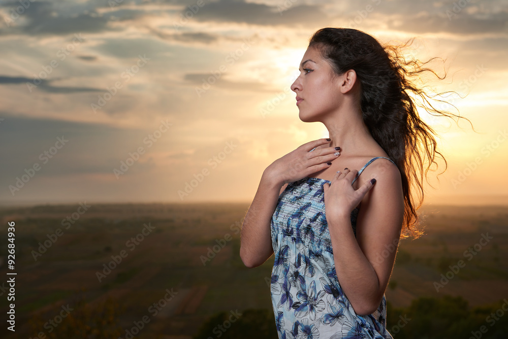 girl portrait at sunset on plain background girl portrait at sunset on plain background