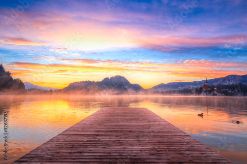 Fototapeta Naklejka Na Ścianę i Meble -  Amazing sunrise at the lake Bled in winter