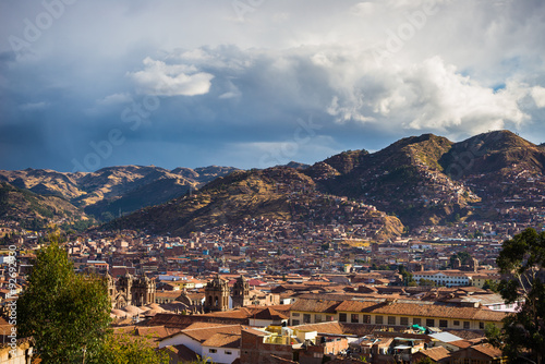 Sunset over Cusco, Peru, with storm clouds