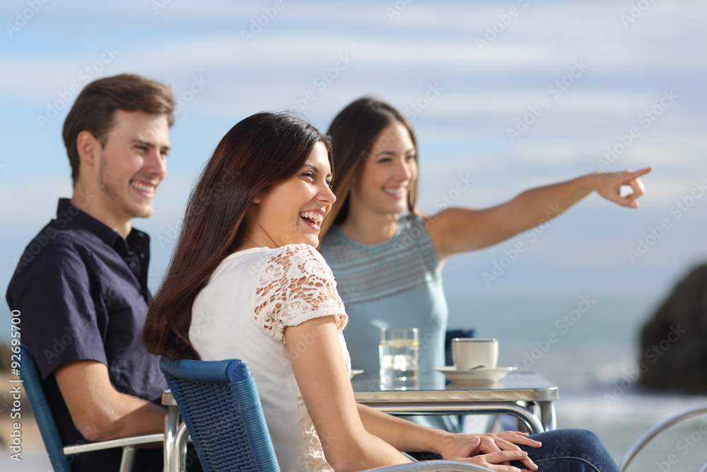 Group of friends looking at horizon in a restaurant Group of friends looking at horizon in a restaurant