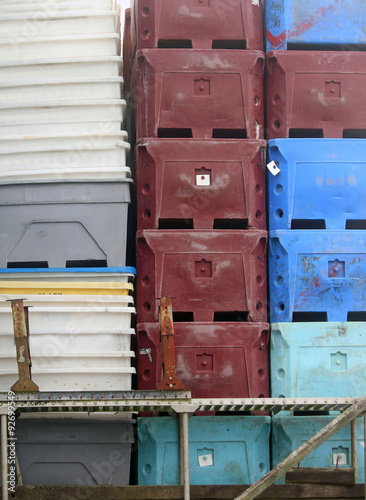 Stacked Fish Packing Crates on a Dock