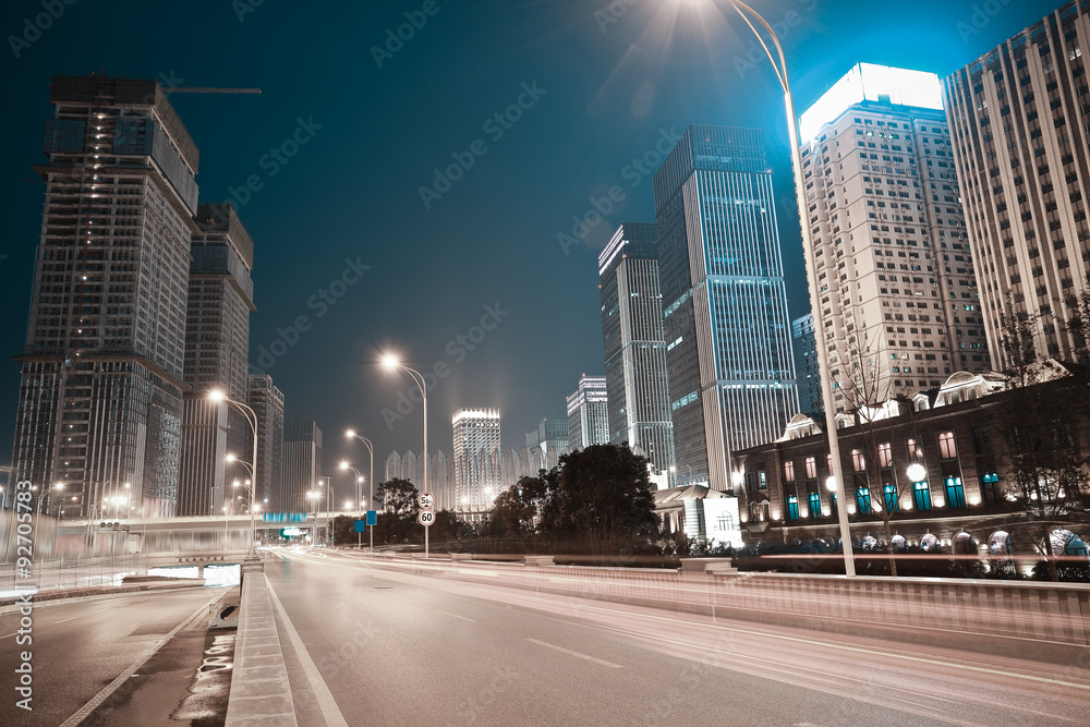 Naklejka premium City building street scene and road of night scene