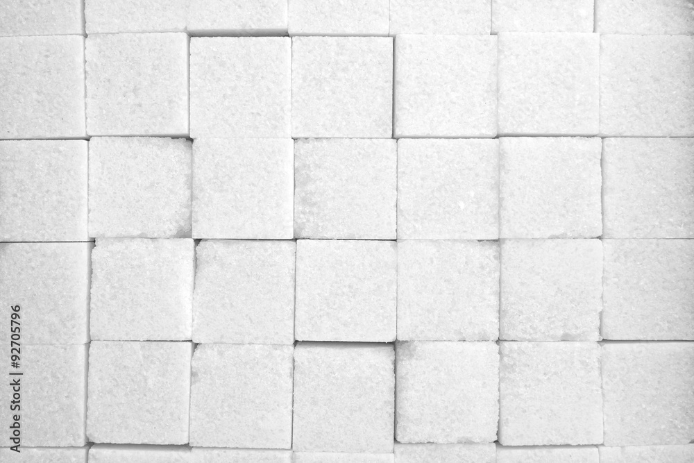 Fototapeta premium white sugar in cubes texture background