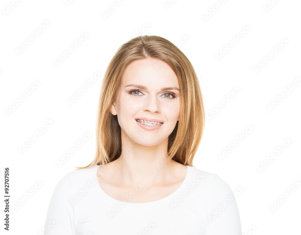 Attractive teenage girl smiling in teeth retainer. Stomatology concept. Attractive teenage girl smiling in teeth retainer. Stomatology concept.