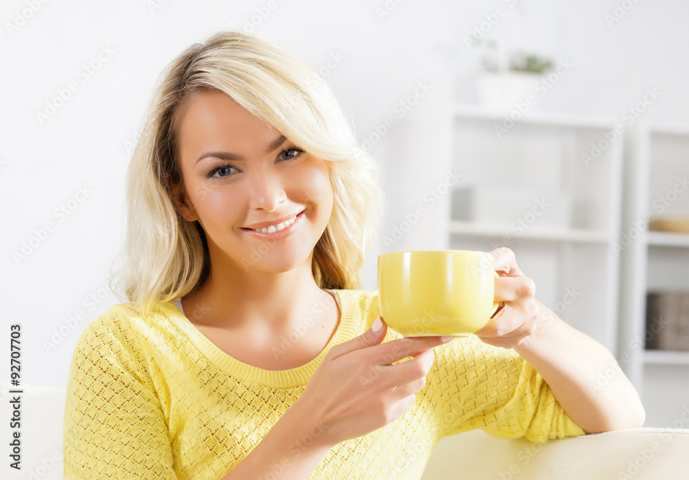 Beautiful woman enjoying the smell of coffee in the morning. Beautiful woman enjoying the smell of coffee in the morning.