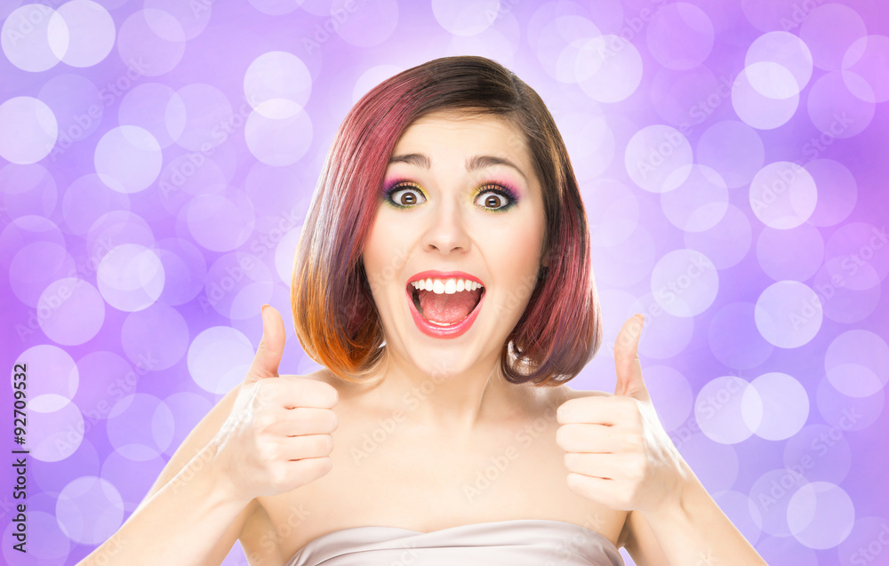 Beautiful smiling girl with colorful make-up on bubble background. Beautiful smiling girl with colorful make-up on bubble background.