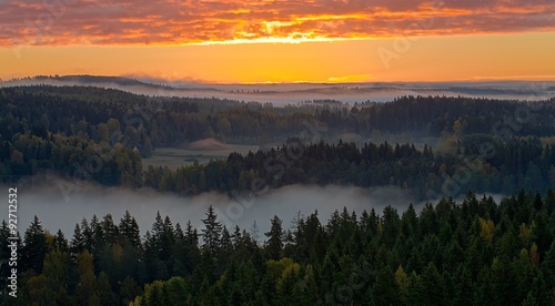 Foggy countryside view. Beautiful misty morning at Aulanko national urban park in Finland.