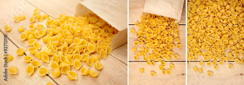 shells pasta isolated on a wooden background