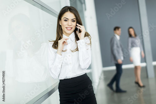 Young woman in office with ...