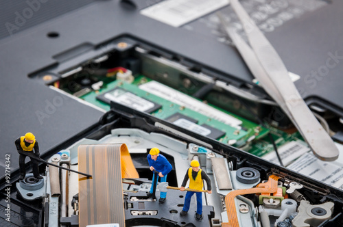 Engineers Fixing Computer Circuit Board, miniature people