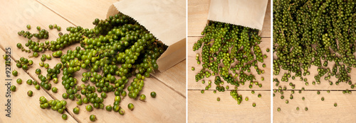 fresh green peppercorn isolated on a wooden background