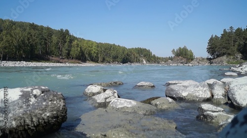 Flow and stones Katun River in Altai in the summer.