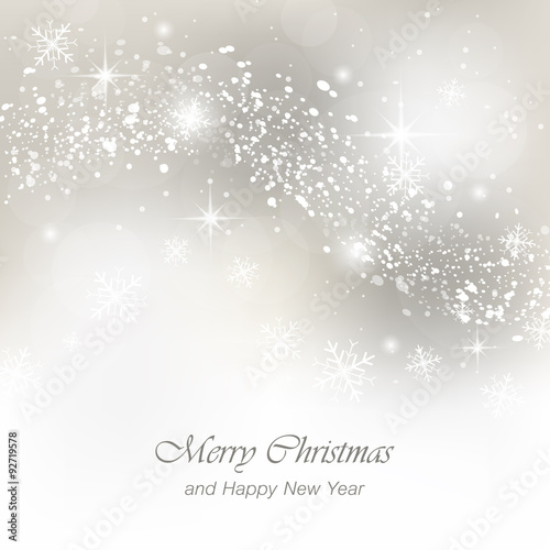 Christmas greeting card with snowfall, flakes and glow.