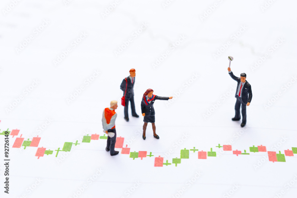 stock market graph, data analyzing with miniature people