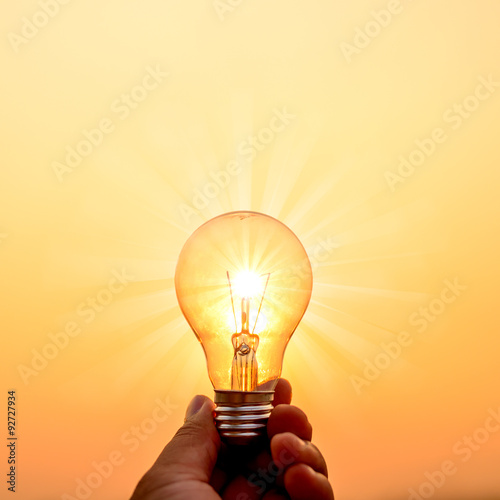 light bulb hold in hand